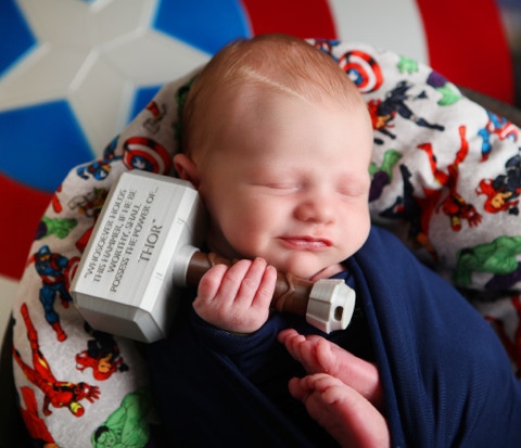 Marvel at this newborn photo by Jayne Poole photography based in Torrington, near Bideford, Barnstaple, South Molton, Fremington, Bickington, Northa, Appledore, Braunton, Croyde, Woolacombe, Ilfracombe, Crediton, Okehampton. Thor newborn photo shoot